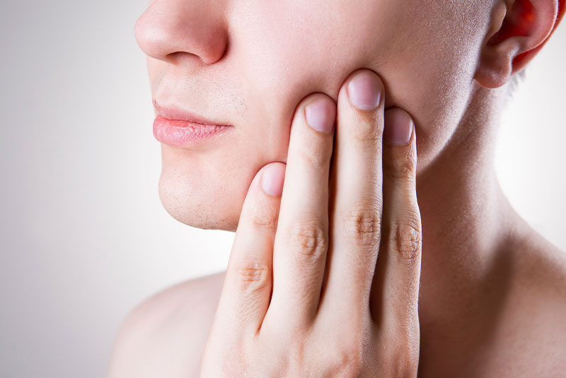 Man with a toothache